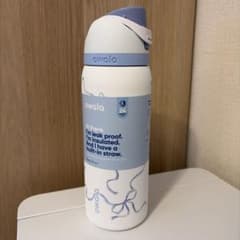値下げ中‼️ owala UO限定 水筒 リボン 水色 - メルカリ