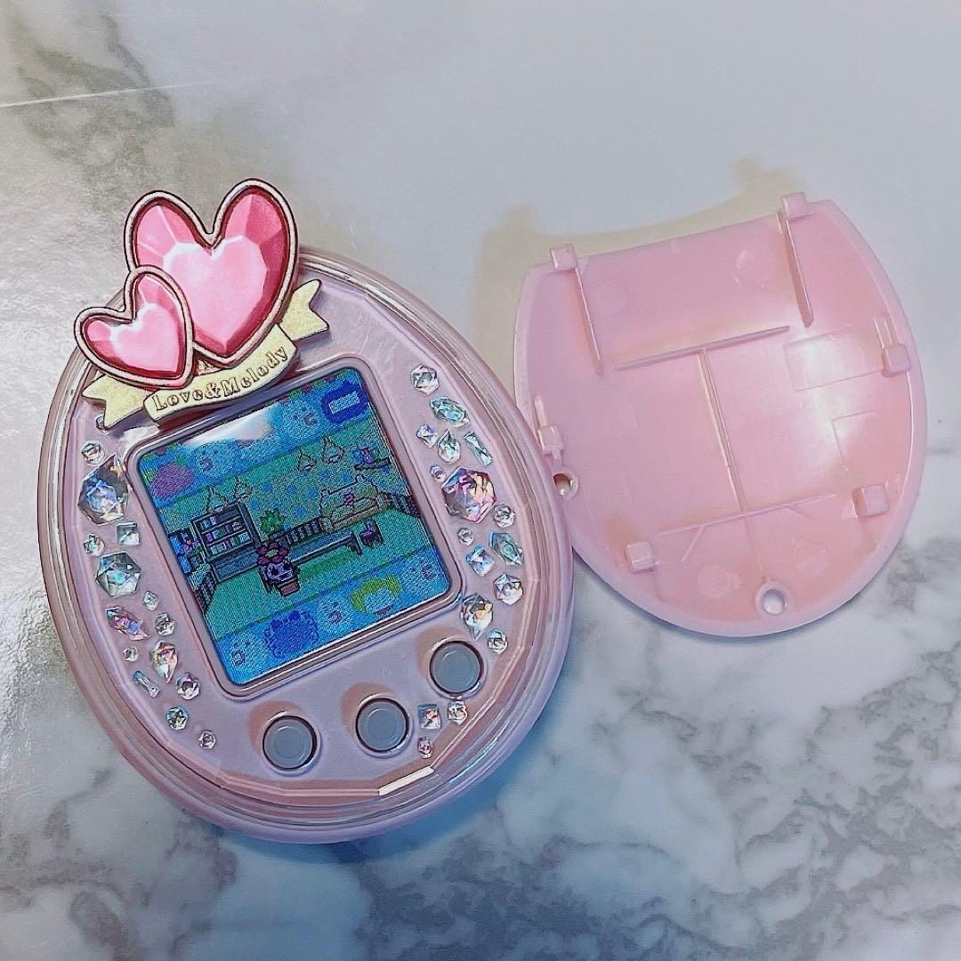 たまごっちピース ピンク たまデコピアス ラブメロver. セット - メルカリ