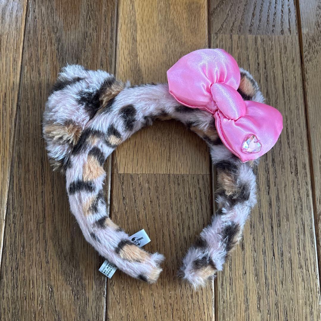 ヒョウ柄リボン付きカチューシャ - メルカリ