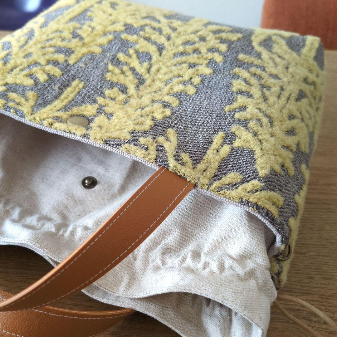 あおりポケットのあおりポケットの巾着バッグ＊ミナペルホネン metsa