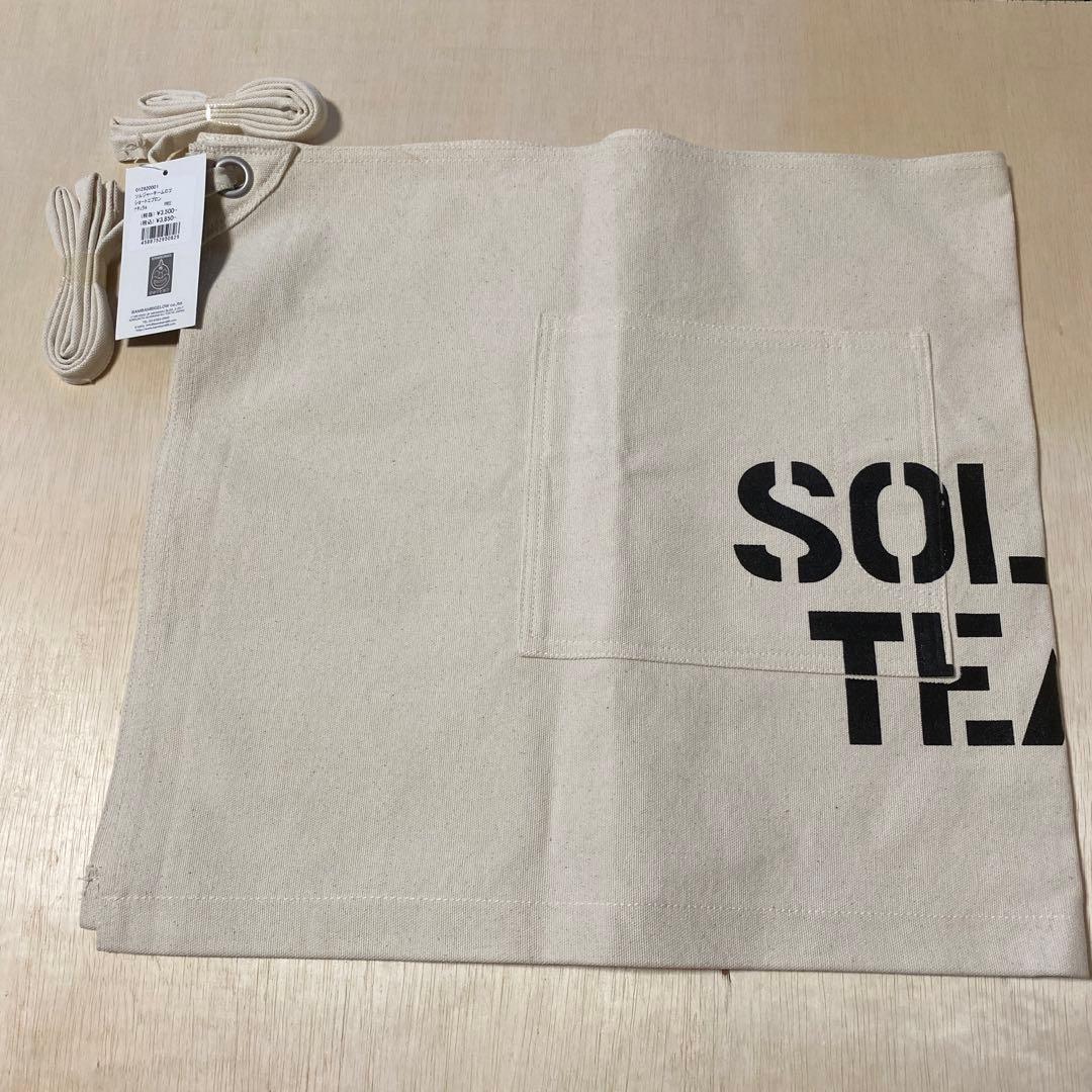 ソルジャーチームロゴショートエプロン 【色:ナチュラル】 - メルカリ