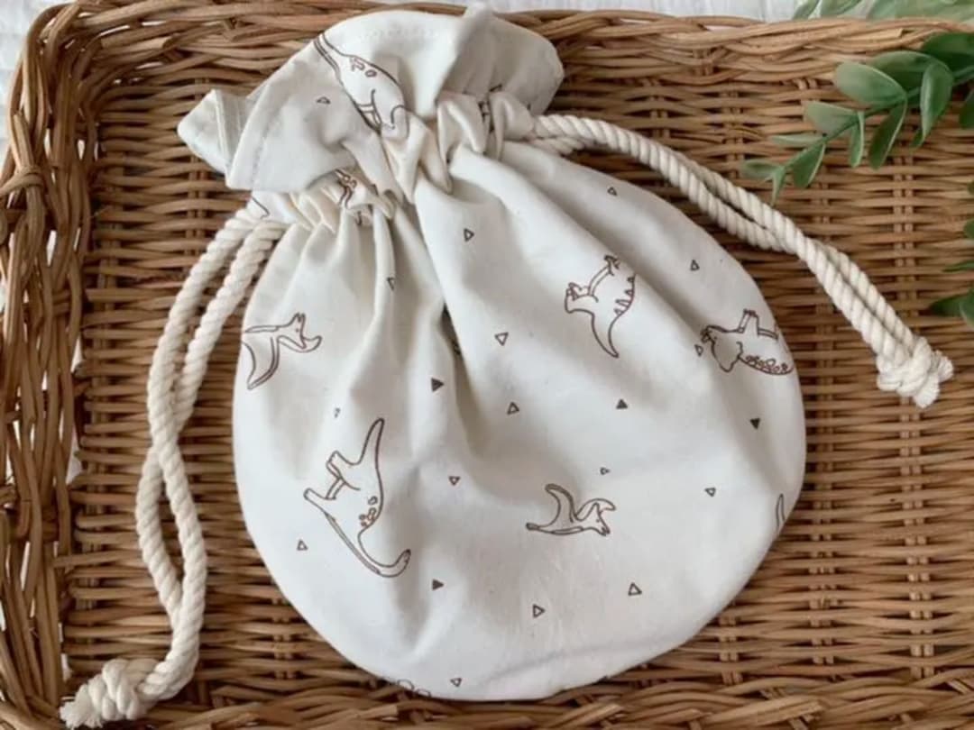 ✳︎専用✳︎再販✳︎ハンドメイド✳︎ダイナソー 恐竜 丸型巾着の通販