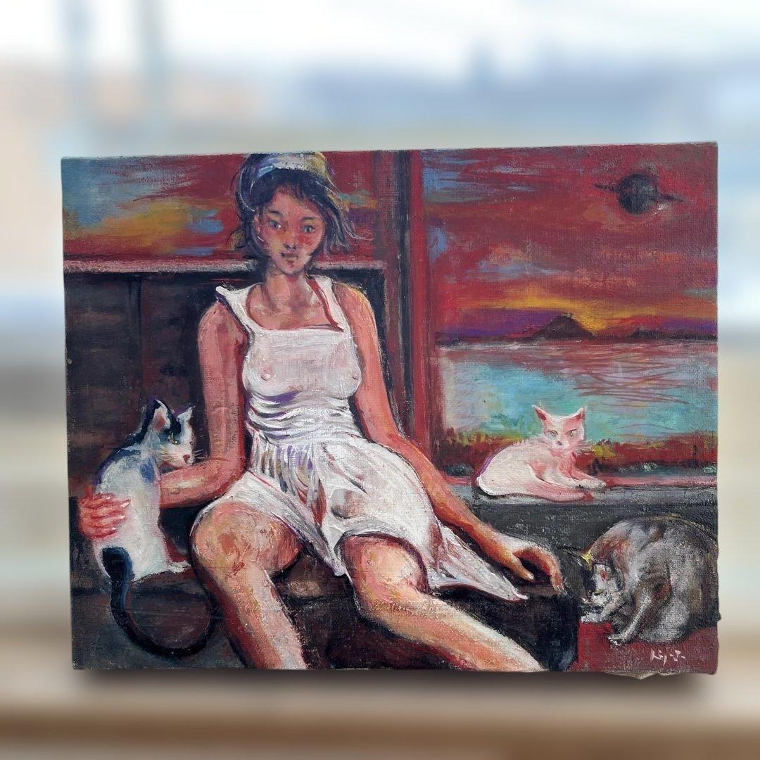 女性と猫の油彩画　　27✖️ 22