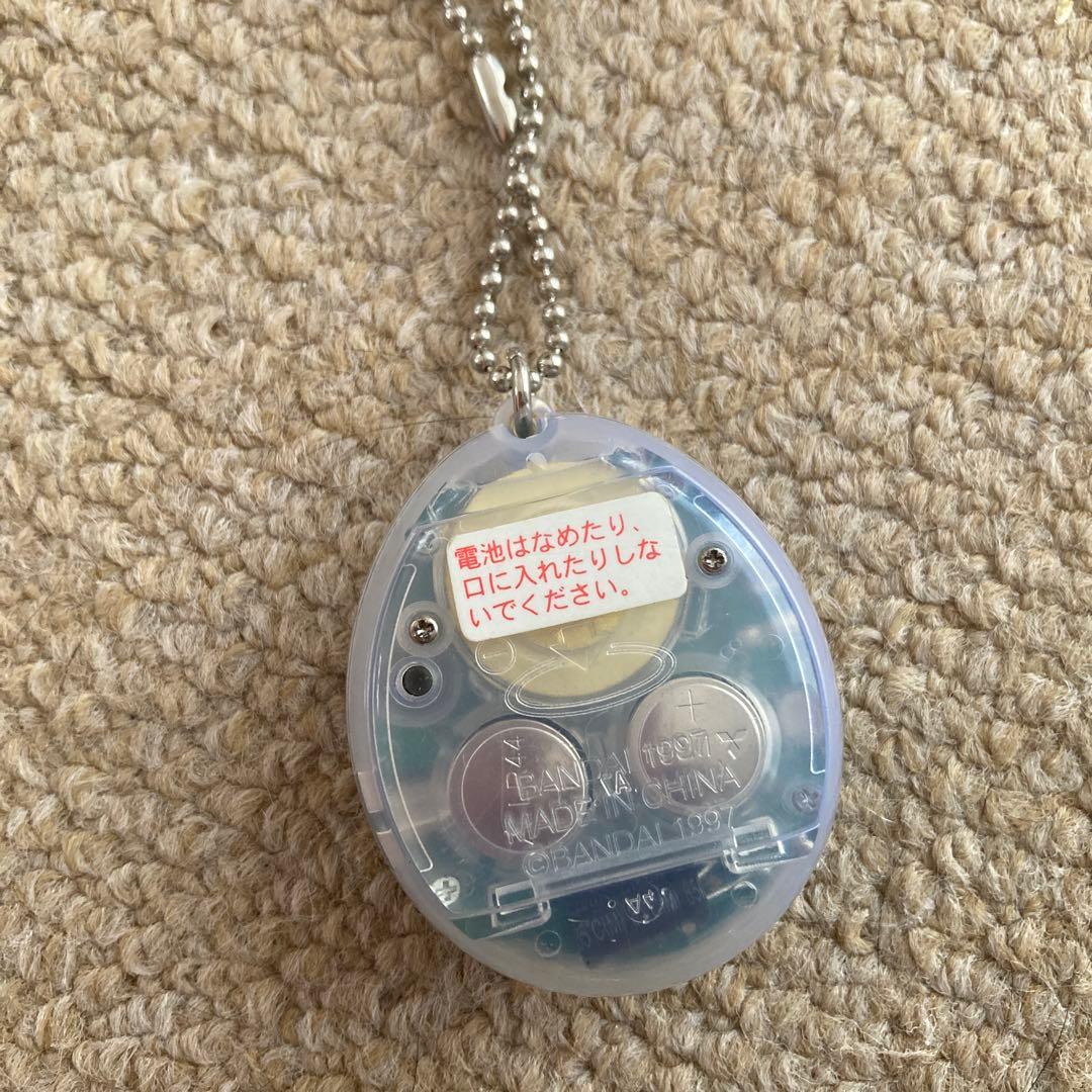 青 スケルトン透明柄1997年製　海で発見‼︎たまごっち