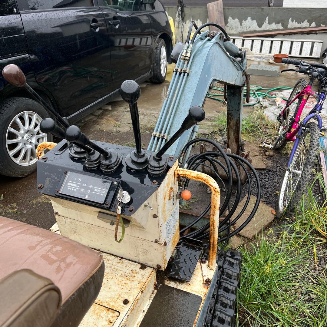 小型バックホー ホワイト/オレンジ