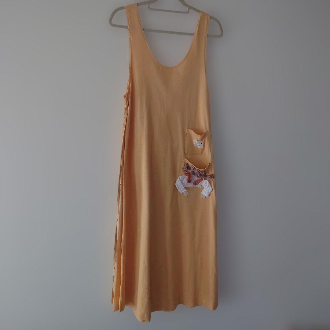 POTECHINO キャラクター付きエプロン オレンジ さえら - メルカリ