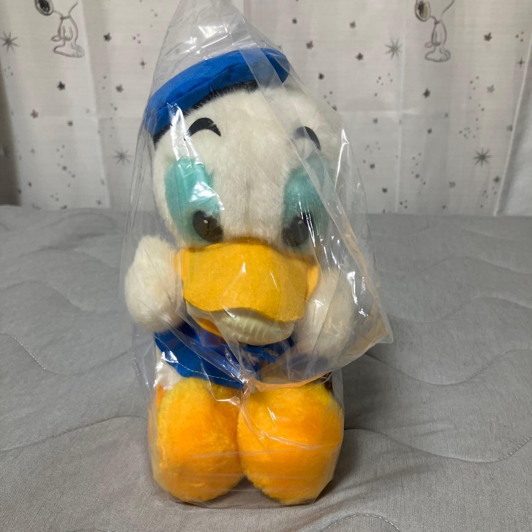 ディズニー ドナルドダック(魚くわえてる)ぬいぐるみ - メルカリ