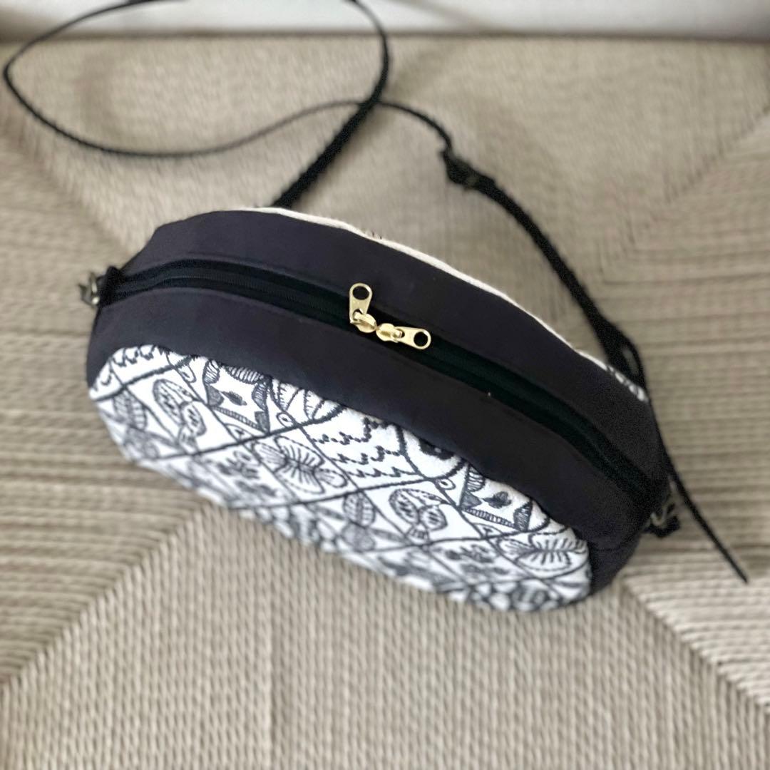 ⚮̈ミナペルホネン　symphony ecru まるまるっこポシェット