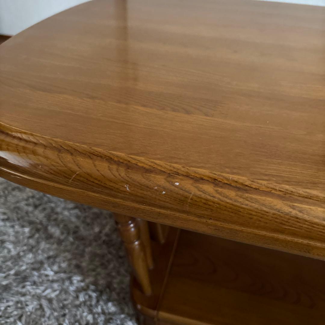値下げしています！木製楕円形リビングローテーブル 下部棚付き