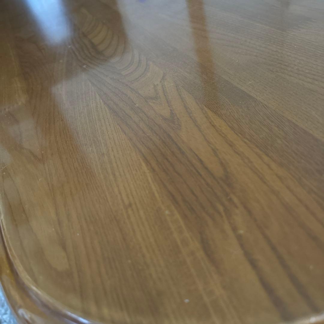 値下げしています！木製楕円形リビングローテーブル 下部棚付き