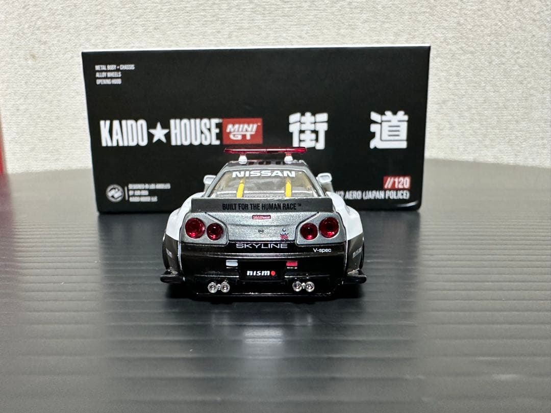 MINI GT 街道ハウス スカイライン R34 ポリス チェイス ③ - メルカリ