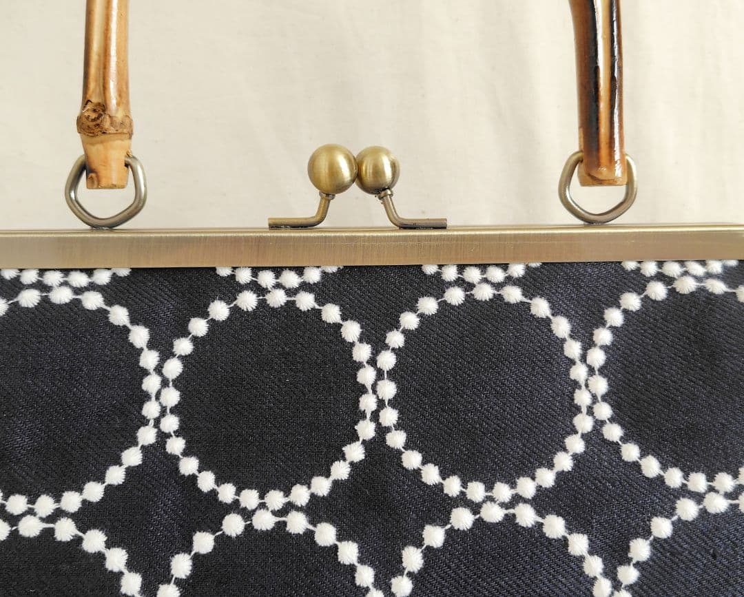 ミナペルホネン タンバリン がま口バッグ 竹ハンドル