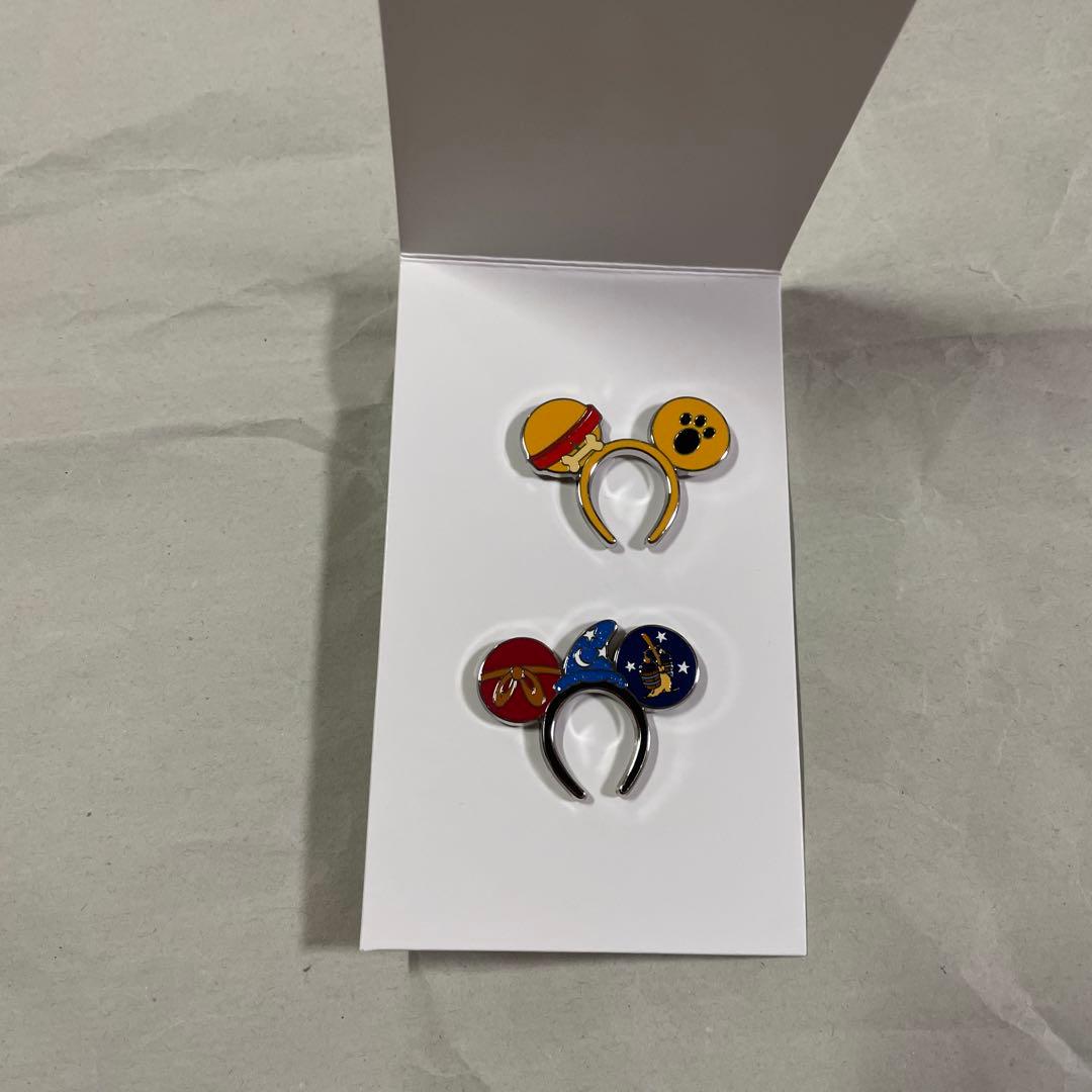 ディズニー リゾート ピンバッジ プルート シークレット - メルカリ