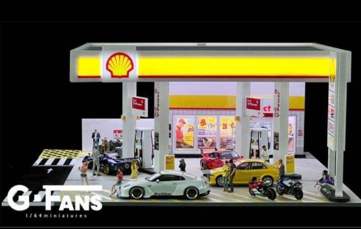 ◉1/64ジオラマ2点セット【シェルGS➕日産ショールーム】（LED付）《新品》