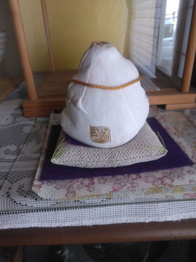 あくび達磨人形