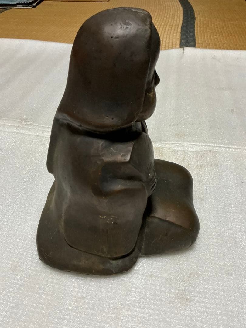 ブロンズ製のお多福さん。【重量が5kgもあります】。