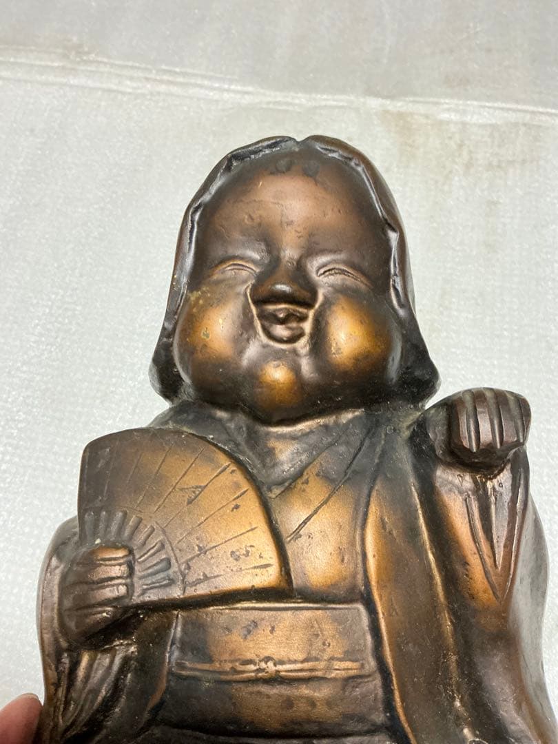 ブロンズ製のお多福さん。【重量が5kgもあります】。
