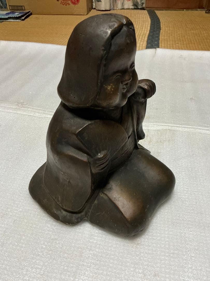 ブロンズ製のお多福さん。【重量が5kgもあります】。