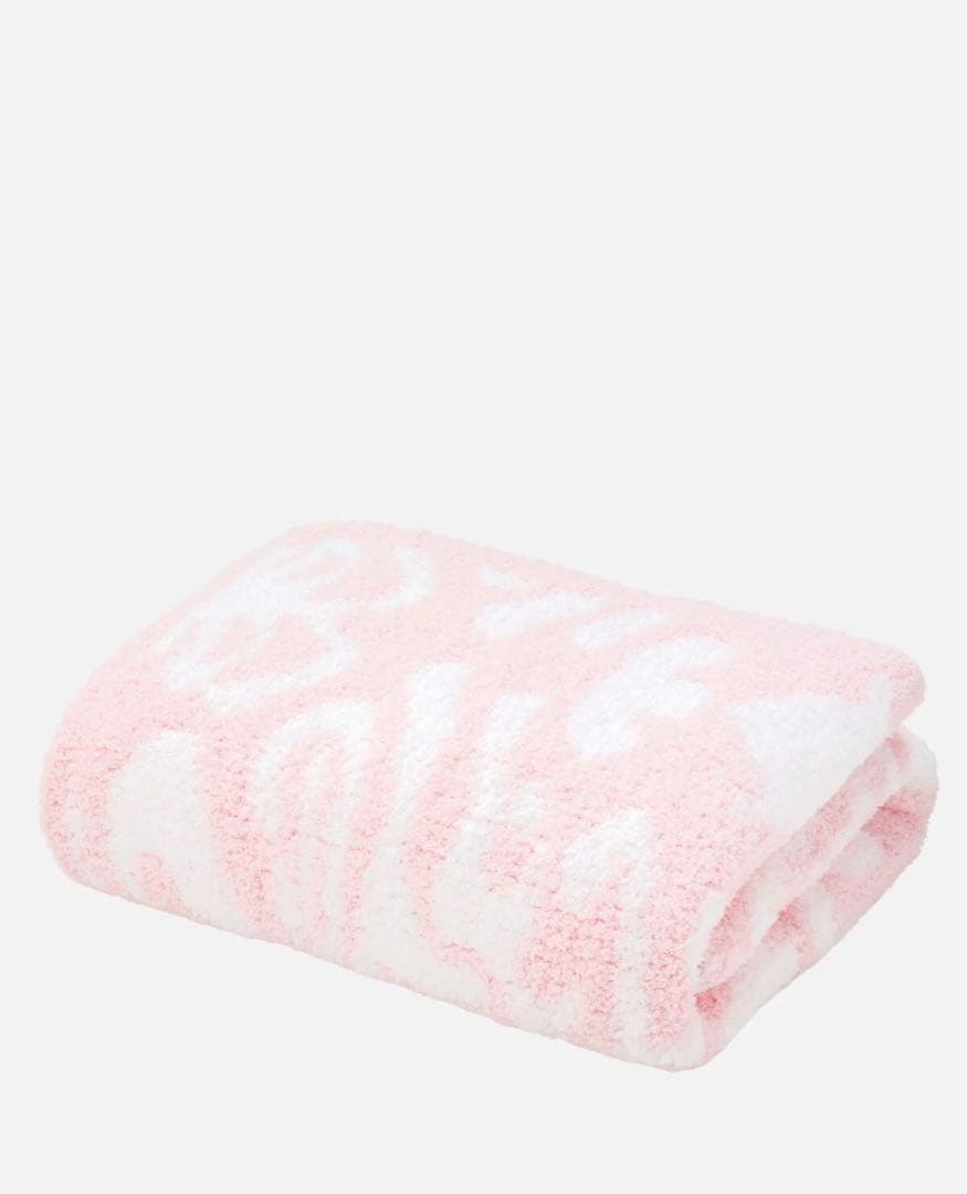ピンクとホワイトの模様のブランケット