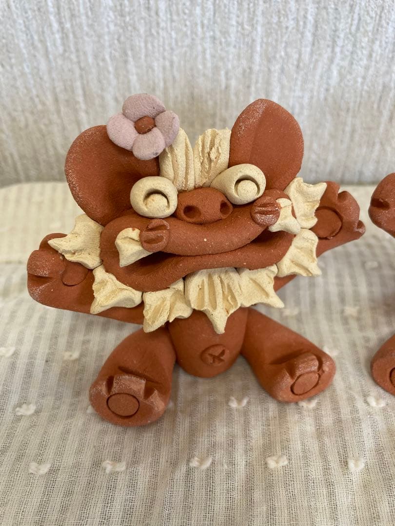 シーサー　御守り　魔除け　厄除け　笑顔　ニコニコ　陶器　焼き物　やちむんシーサー