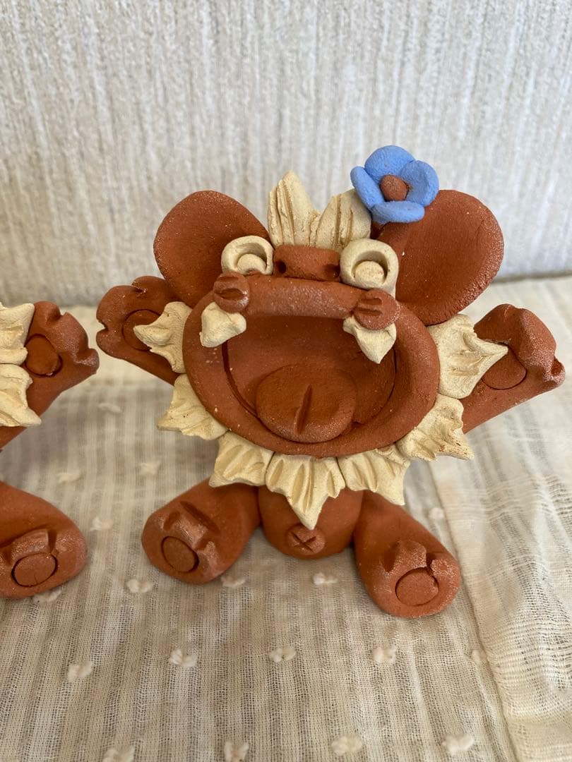 シーサー　御守り　魔除け　厄除け　笑顔　ニコニコ　陶器　焼き物　やちむんシーサー