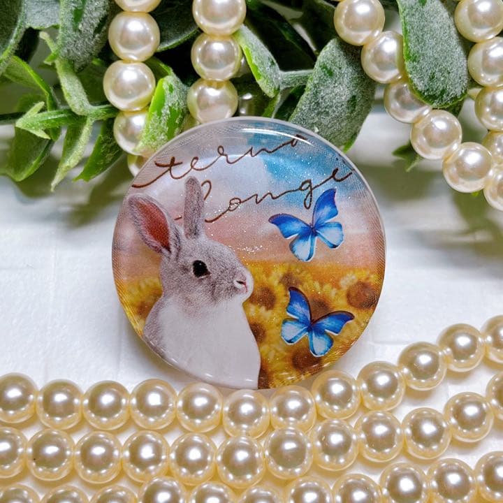 ぼたもち様お取置きです。レジンヘアゴム ひまわり畑とうさぎちゃんNo.511