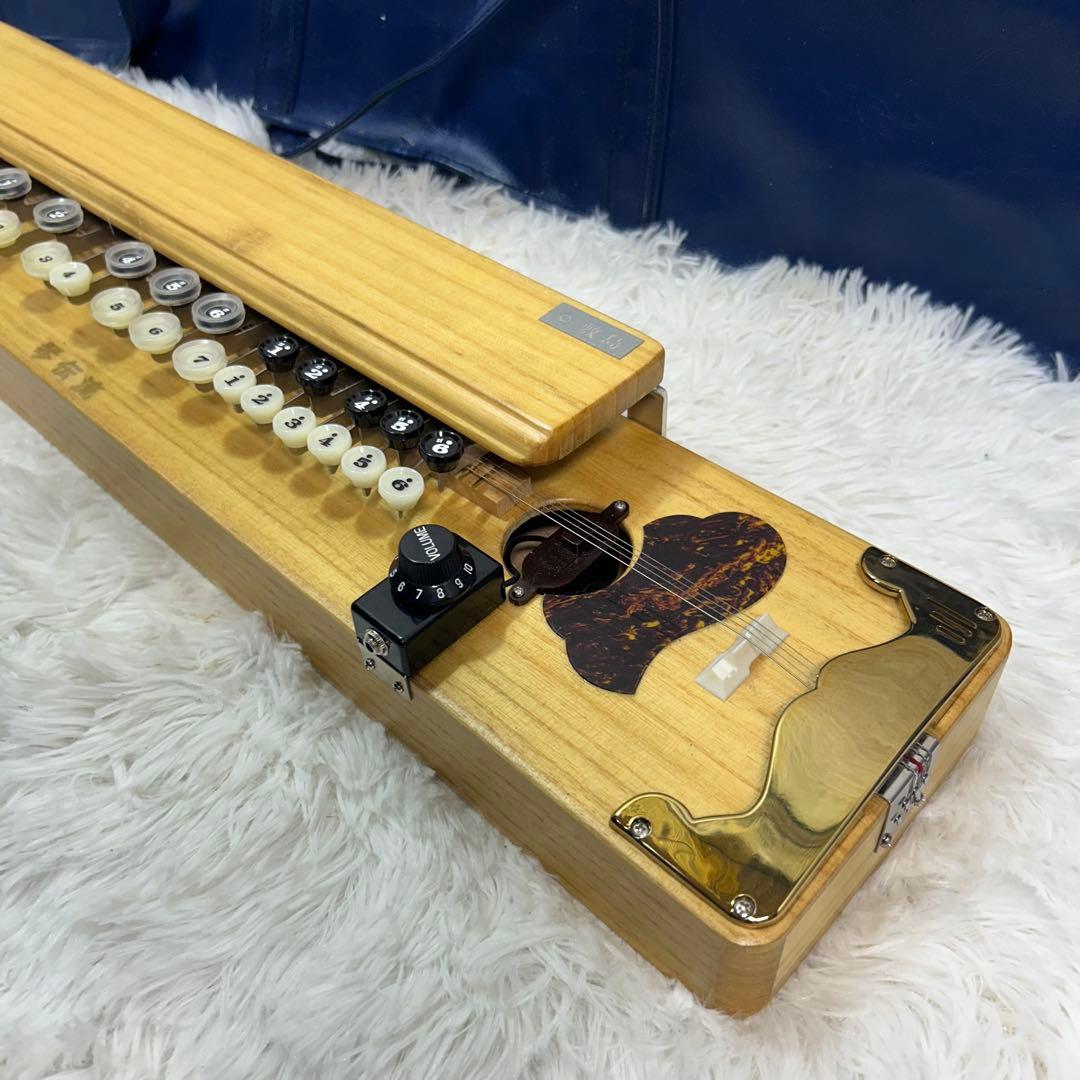 美品】琴伝流 敷島クリア 電気 大正琴 ナチュラル木目 河合楽器 - メルカリ