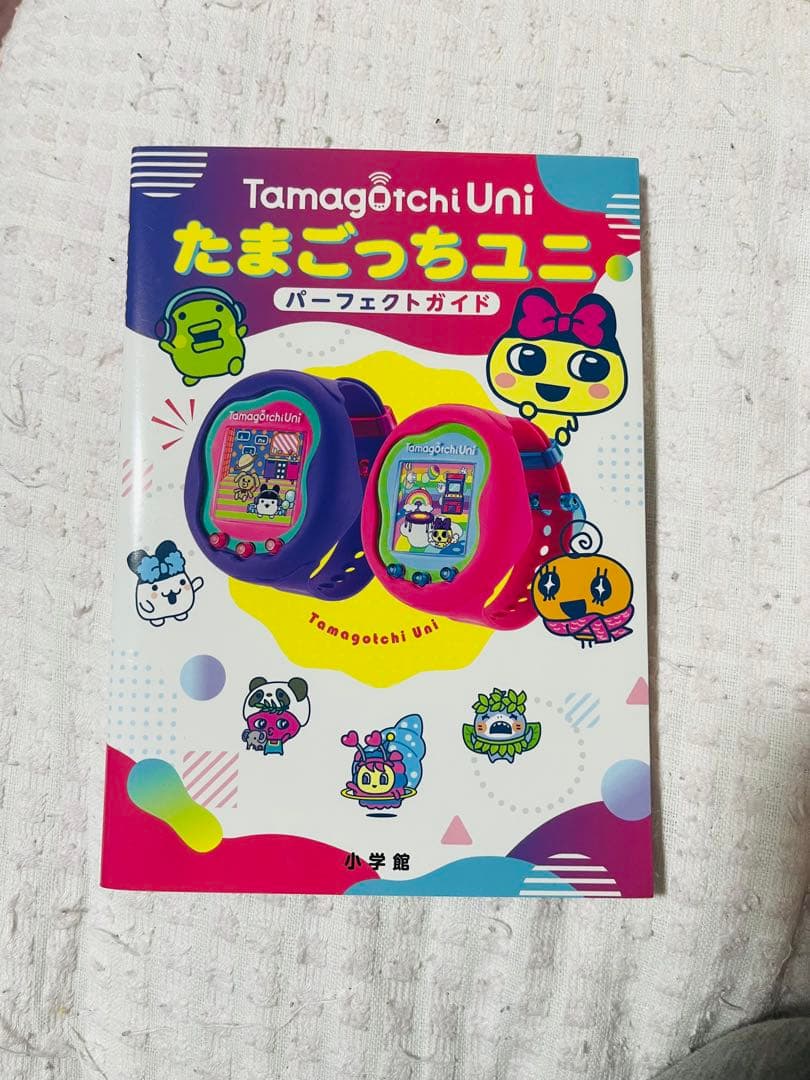 Tamagotchi Uni 本体とケースとガイド
