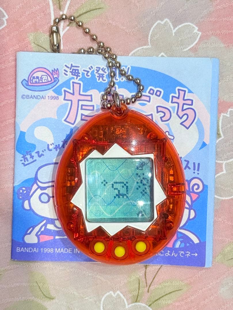 動作確認済】海で発見！！たまごっち 透明(こはく) - メルカリ