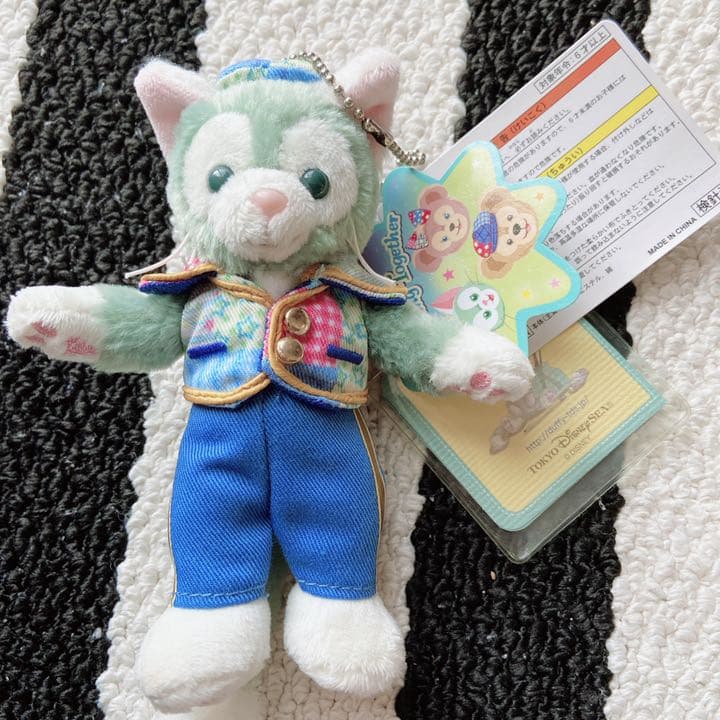 ジェラトーニぬいぐるみバッジ ディズニーシー15周年 - メルカリ