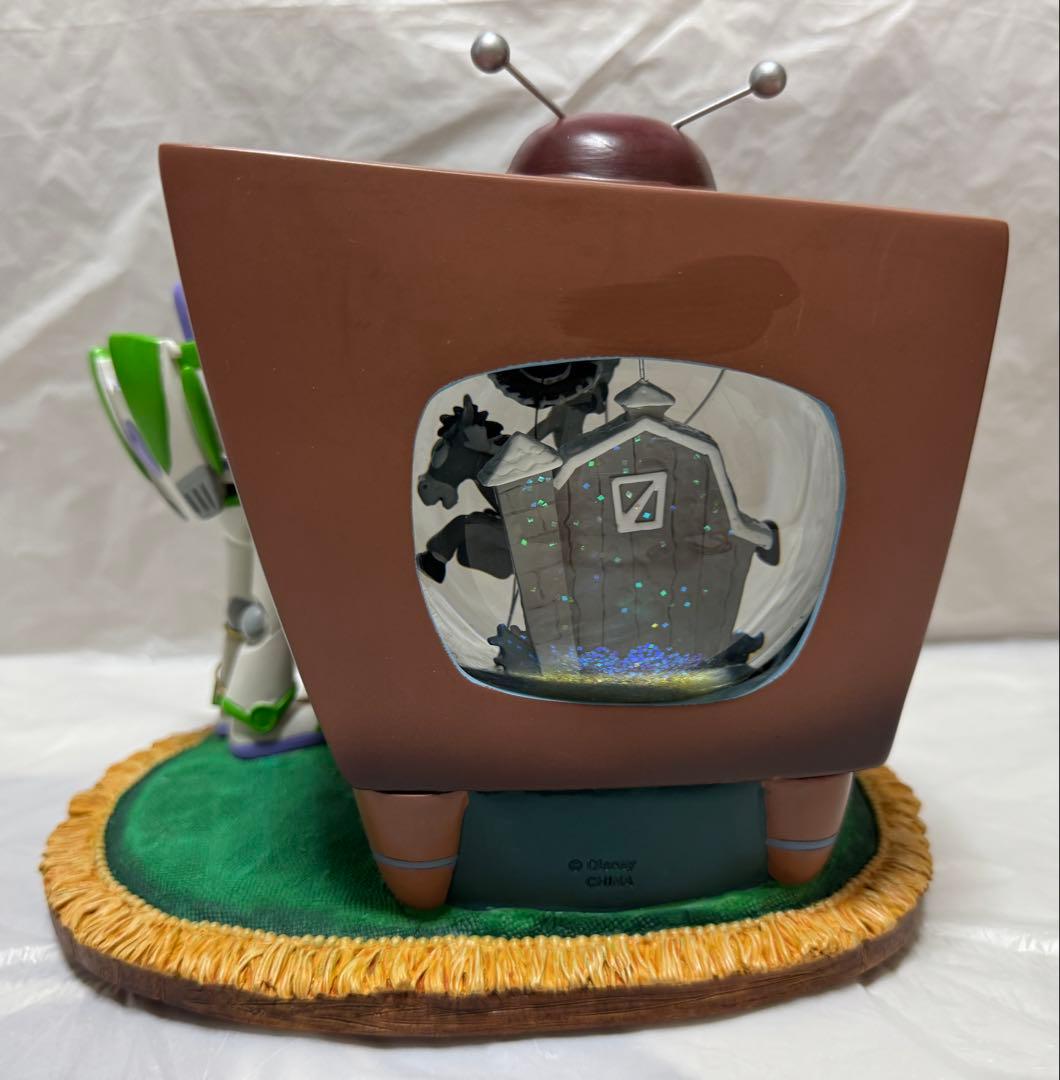 ディズニーストア トイストーリー2 TV型 オルゴール付きスノーグローブ