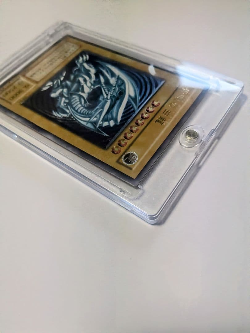 青眼の白龍 UL[SM-51](仮面の呪縛)レリーフ アルティメットレア シク