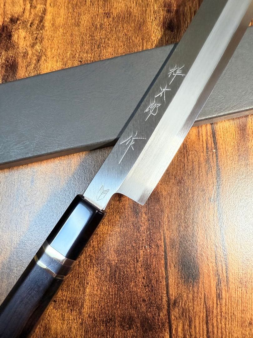 【堺打刃物】祥太郎作　蛸引 先丸　包丁　尺一　銀三鋼　鬼反り黒檀銀巻八角水牛柄