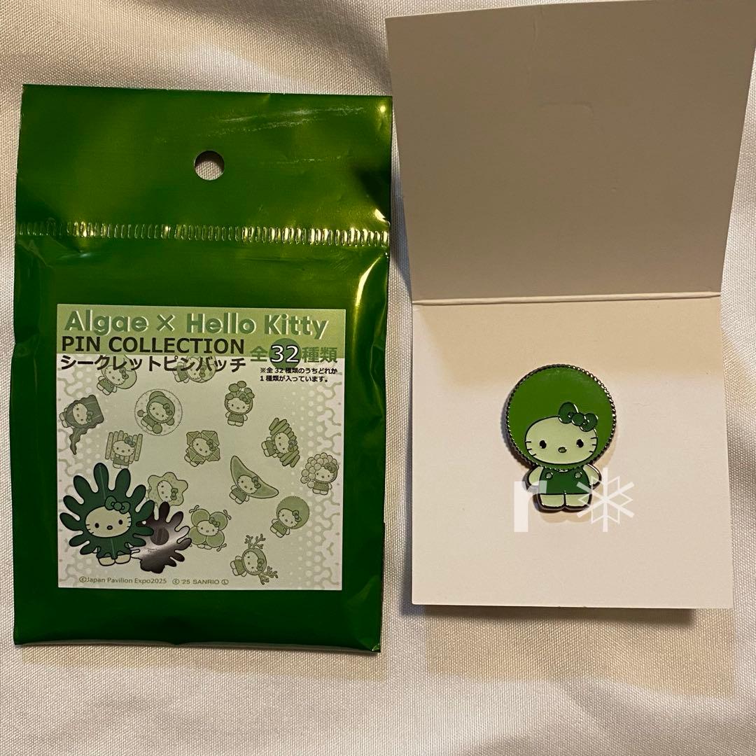 大阪関西万博 日本館 藻 キティ ピンバッジ マリモ - メルカリ
