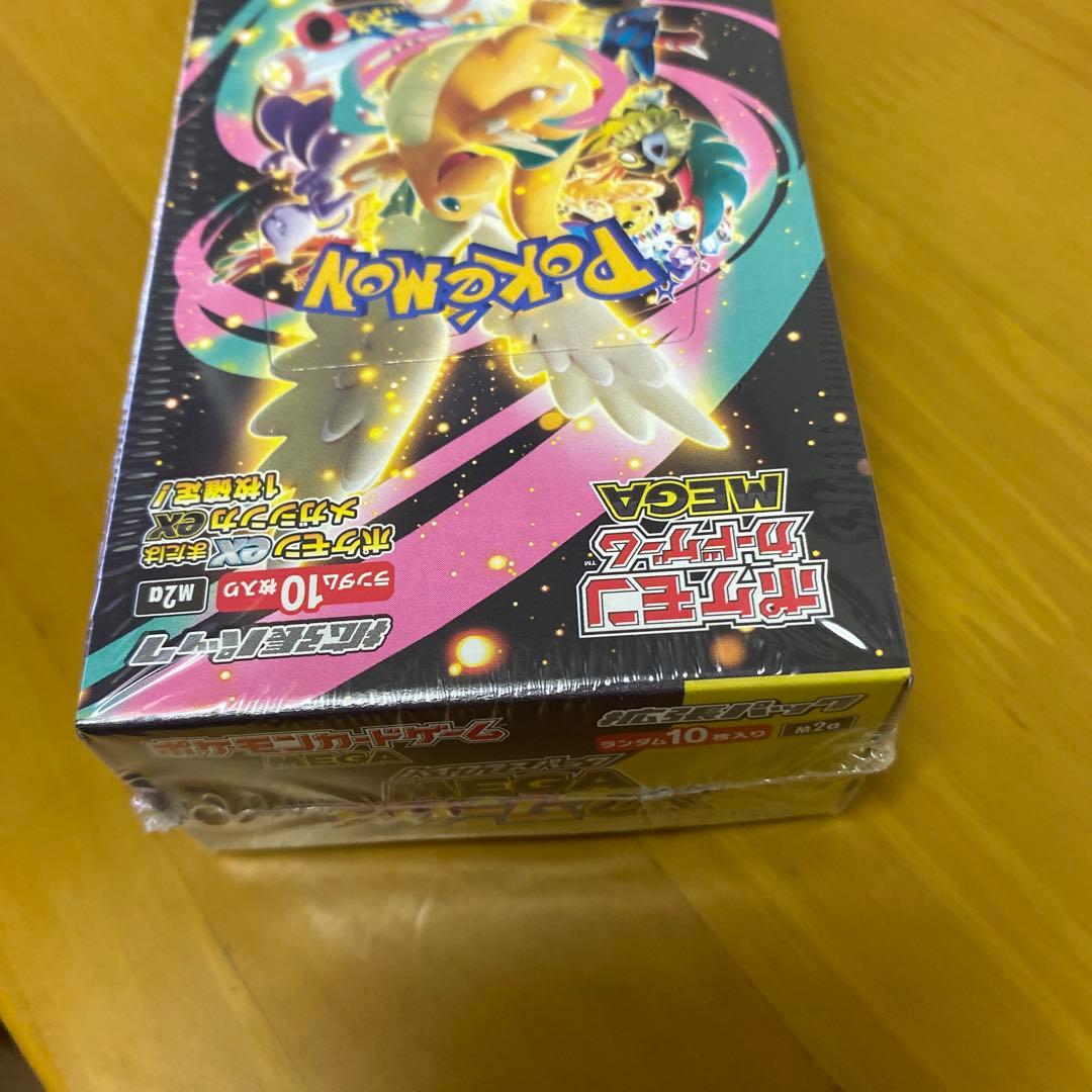 吉*ん様 ポケモン MEGA リザードン EX 10パック入りシュリンク付き