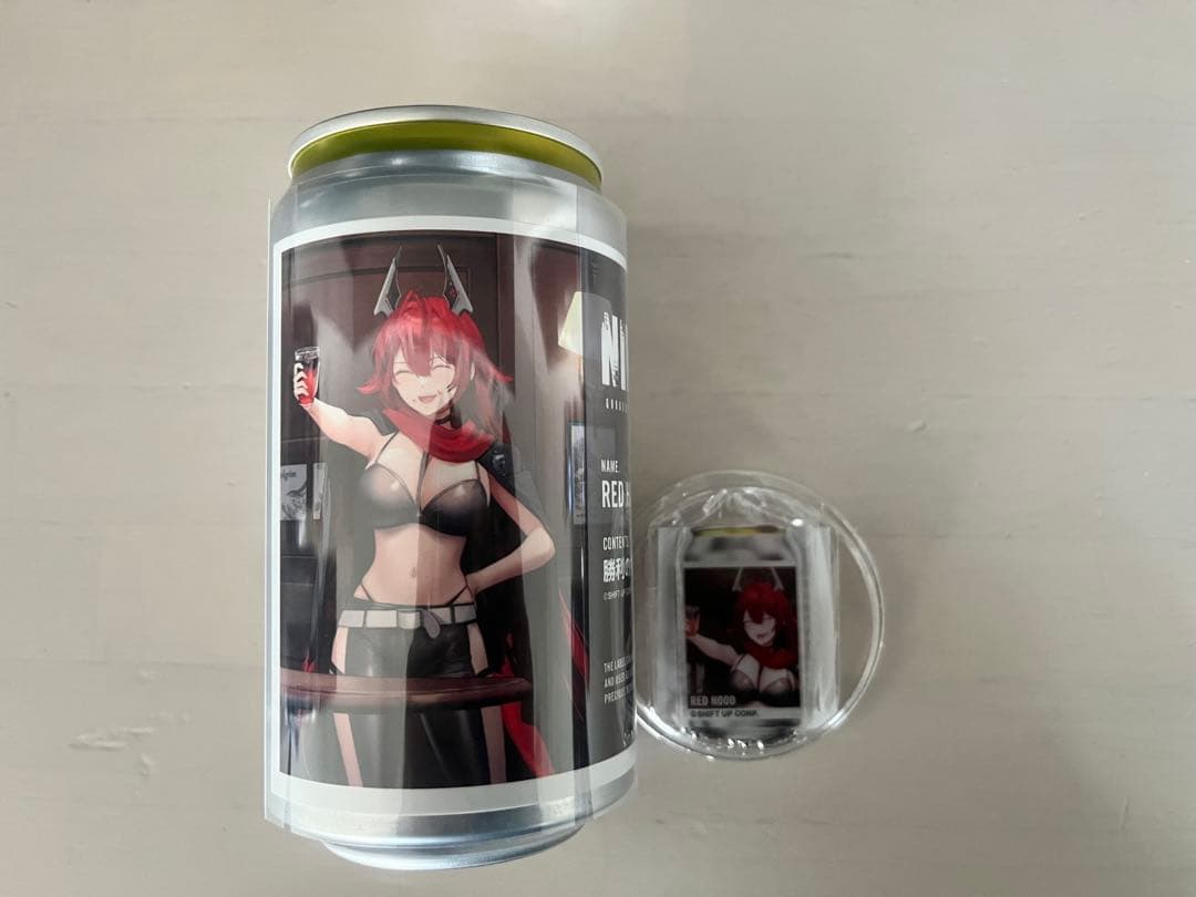 NIKKE ラベル缶アクキー RED HOOD - メルカリ