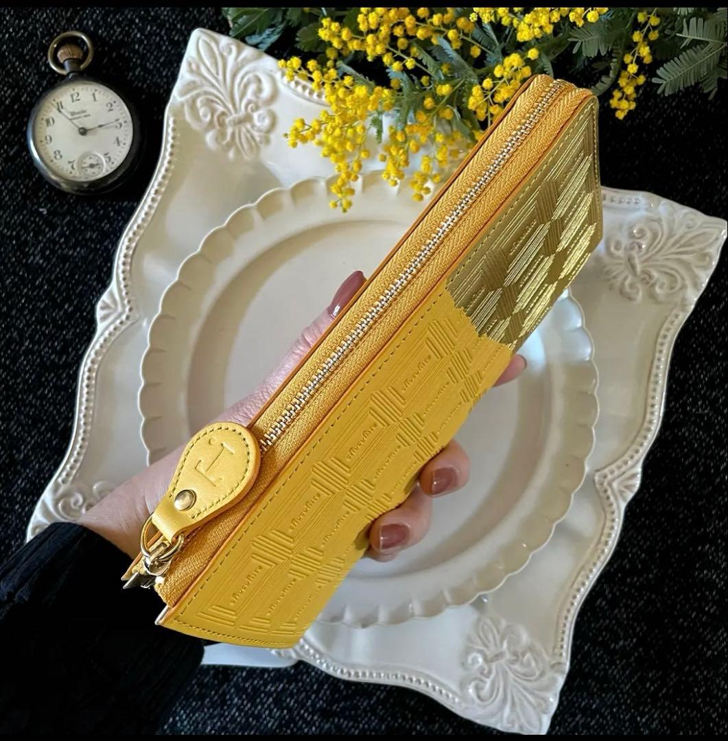 Trooms 革のミモザ色チョコ長財布（金の包み紙）