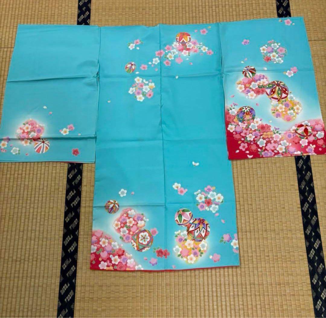 七五三　三ツ身女の子着物　正絹　仮絵羽　爽やか水色　可愛い手毬柄　桜　金彩
