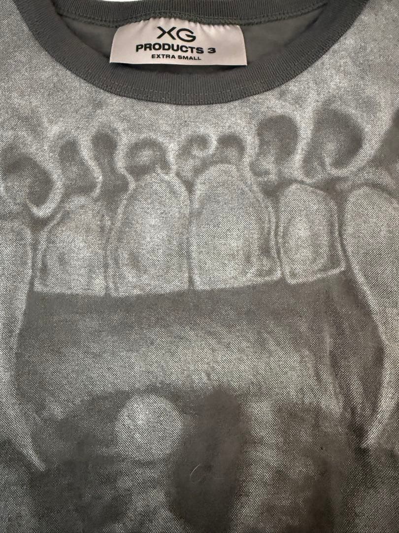試着のみ XG WOKE UP Replica Tee xs - メルカリ