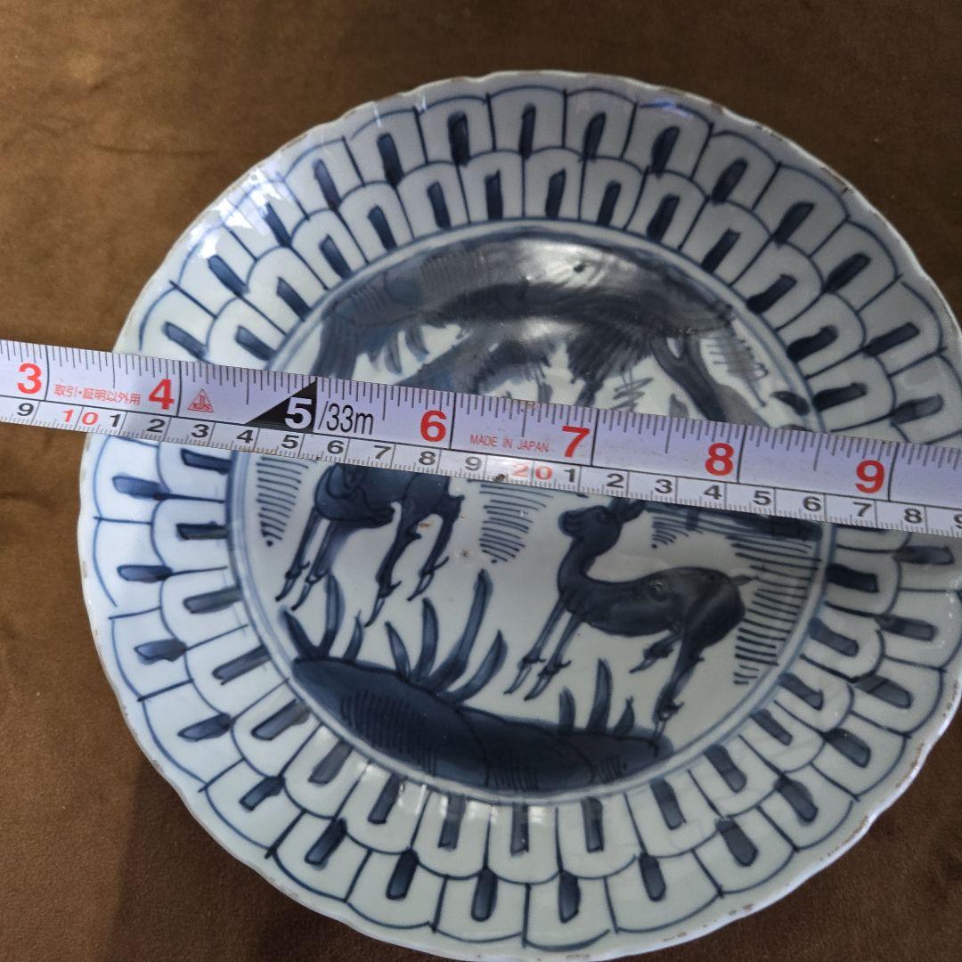 青い動物の絵柄の皿 直径23cm