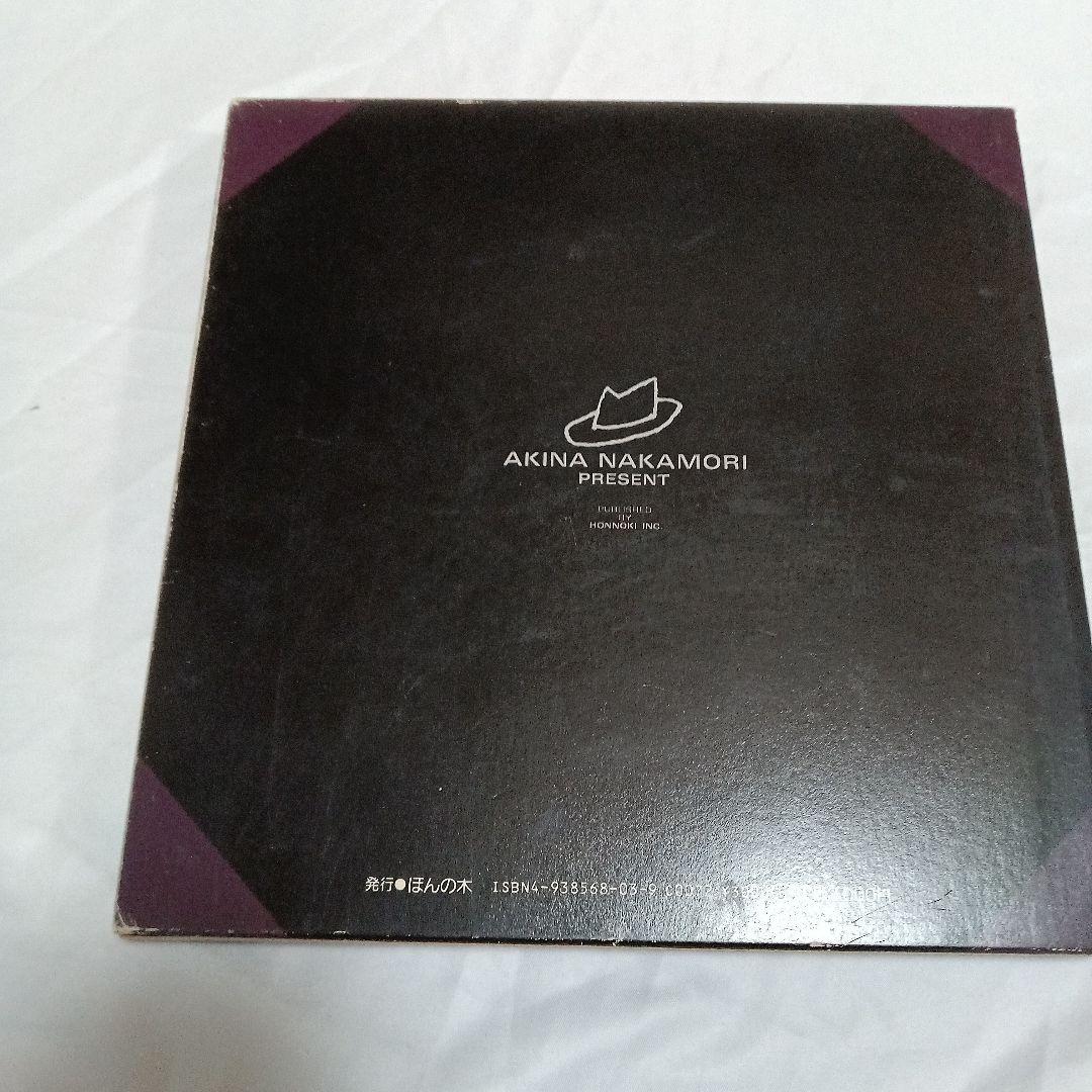 中森明菜 Cross My Palm 写真集 1987 ポストカードや付属品付き - メルカリ