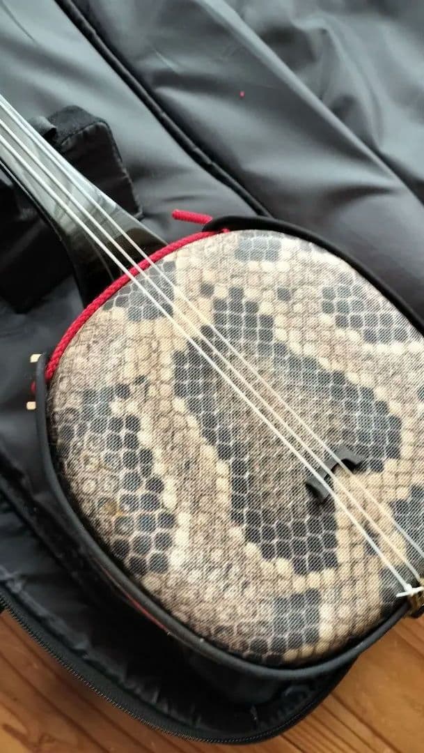 三線 沖縄 人工革