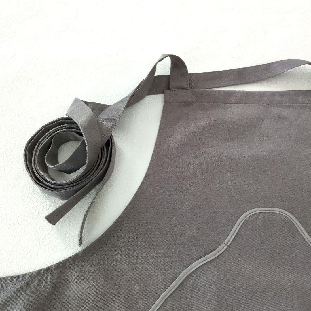 ドラゴンクエスト スマイルスライム エプロン グレー - メルカリ