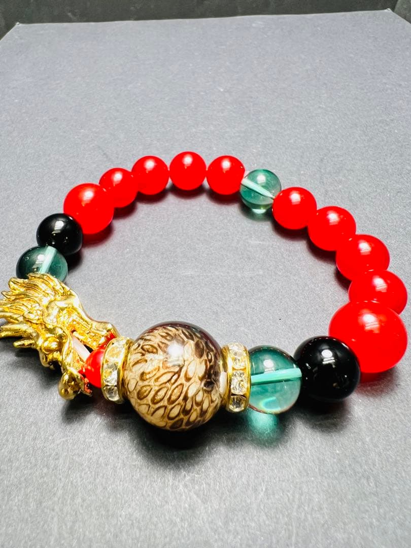 沖縄ハブ琉石&金龍頭 秘紅石 黄緑水晶 超金運ブレスレット❗️宝くじ運 すごい波動