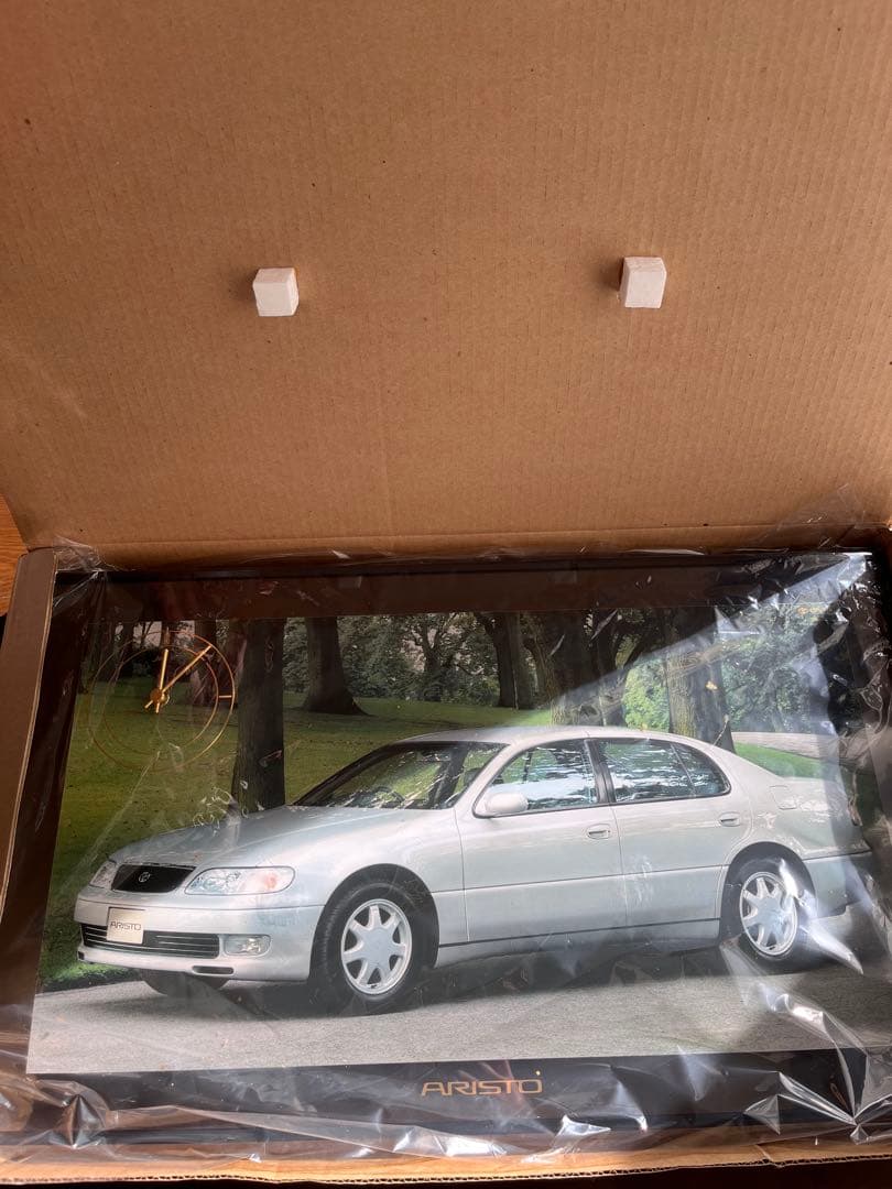 ARISTO 掛時計 シルバー 車の写真