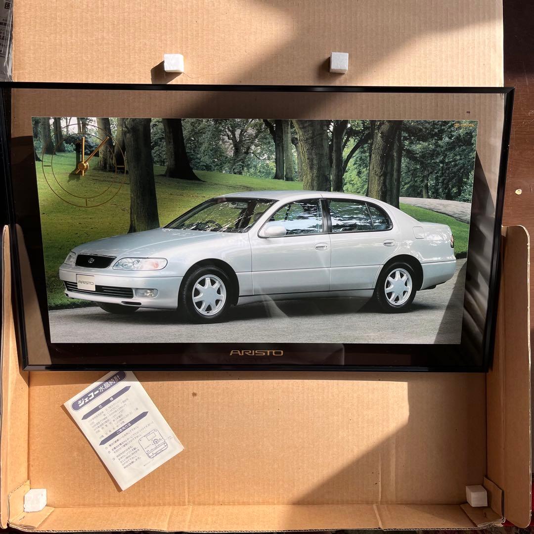 ARISTO 掛時計 シルバー 車の写真