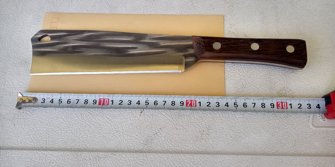 骨切り包丁 波模様鋼 20cm 木製ハンドル約６００g有ります