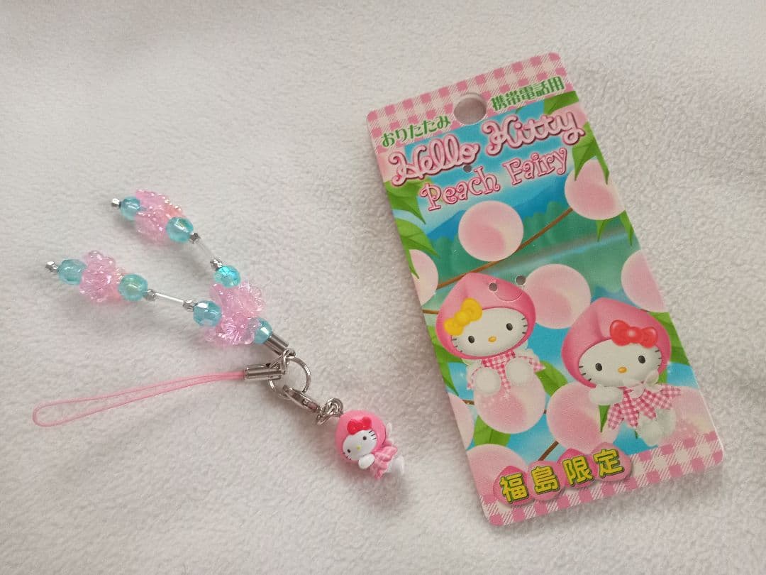 ゆうパケット】ハローキティ根付け 桃 - メルカリ