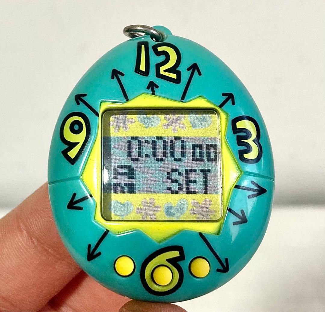 初代 たまごっち TMGC 時計柄 ブルー 動作確認済み - メルカリ