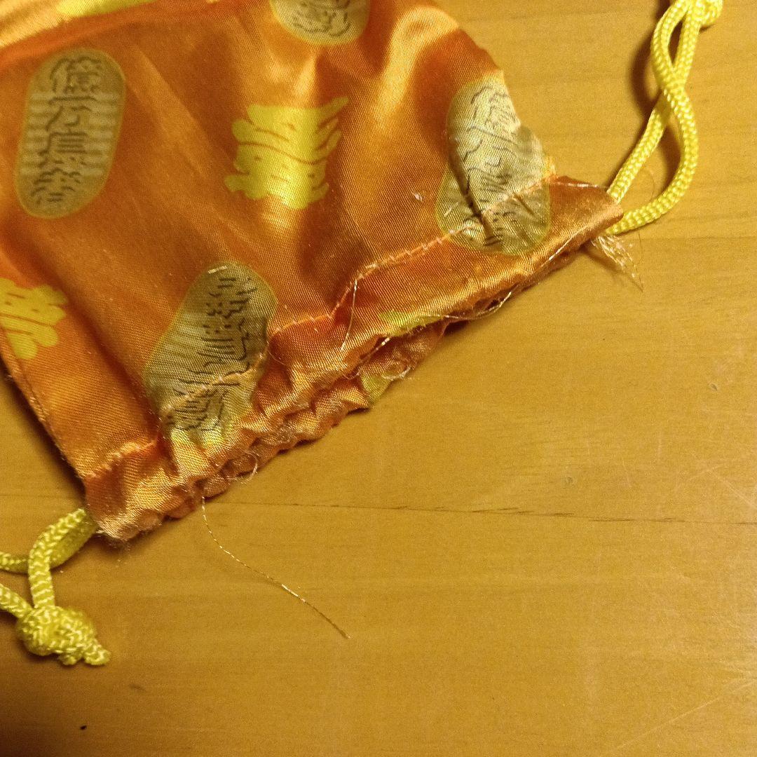 初めて宝くじで億萬長者になった時の巾着袋です